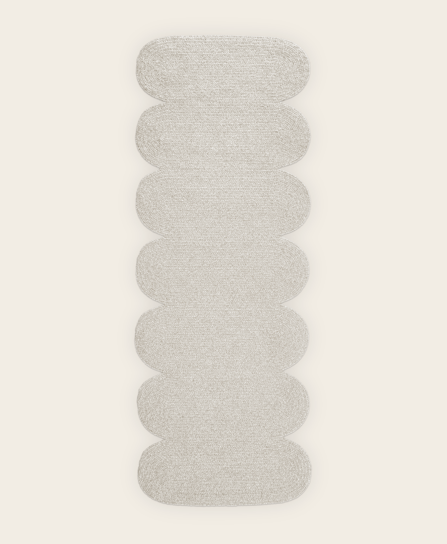Light grey sustainable wool runner in curvy shape