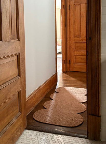 hallway with a curvy wavy wool runner in clay 