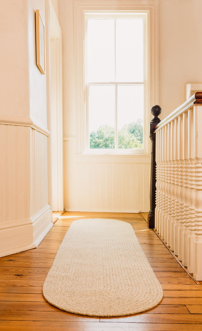 Oval light grey runner made with sustainable wool in the USA