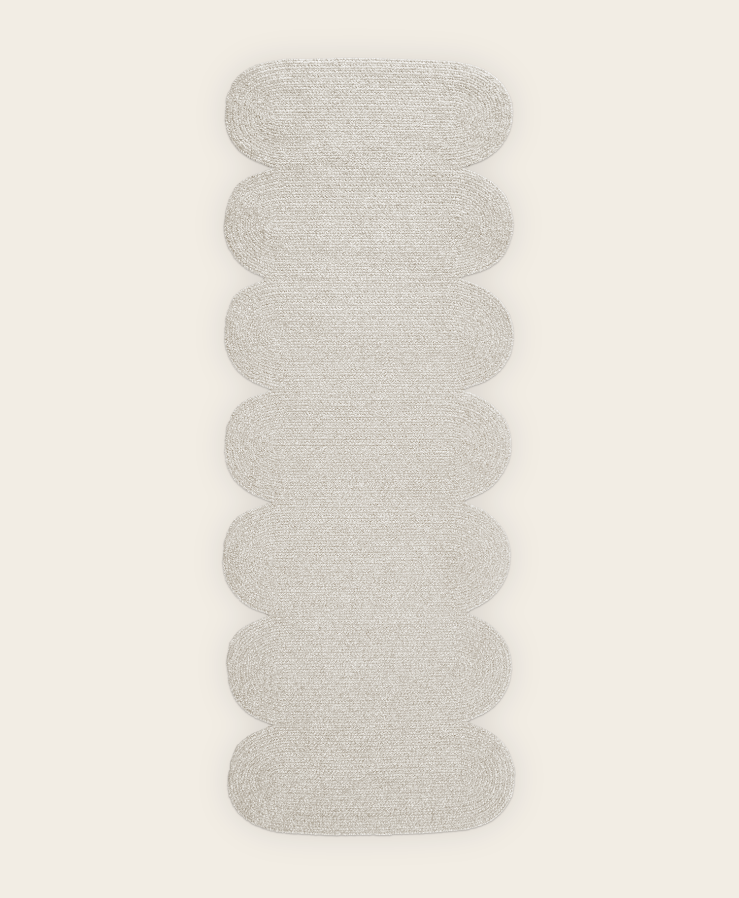 Light grey sustainable wool runner in curvy shape